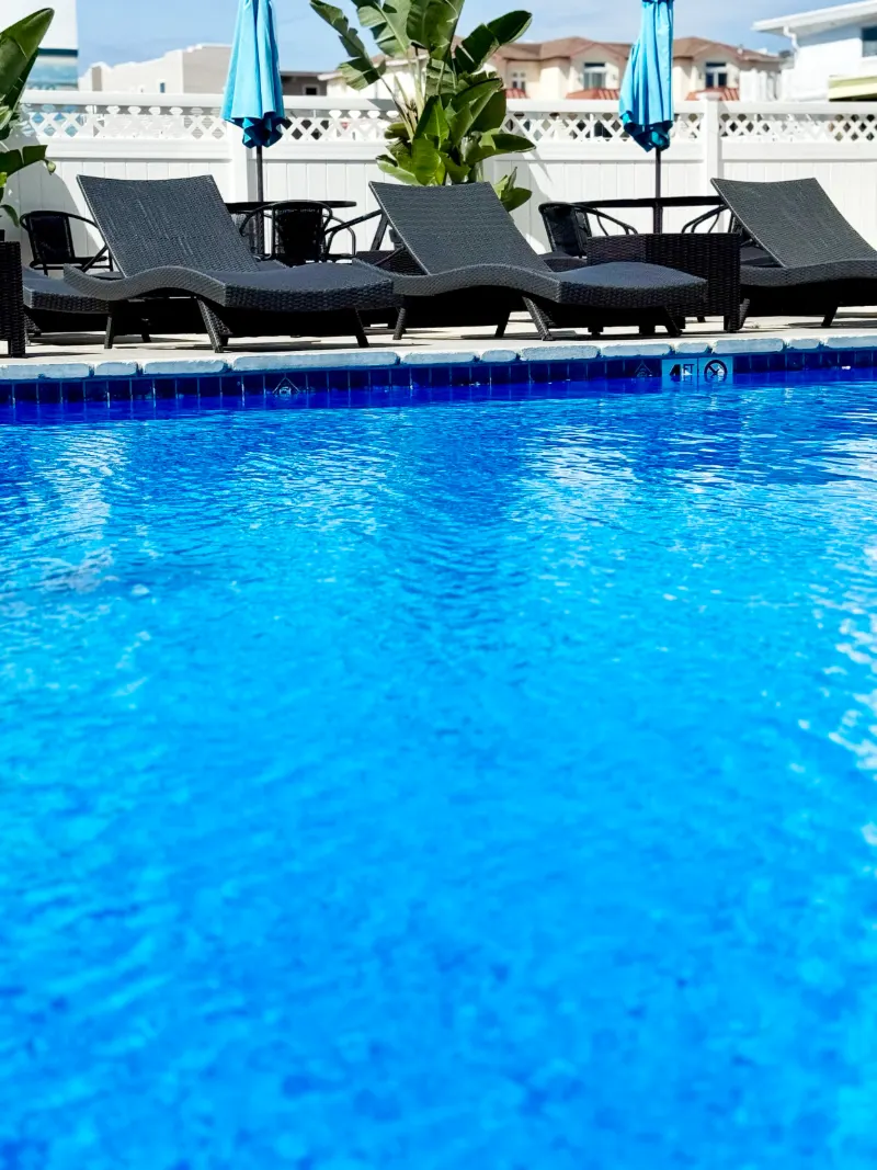 The heated pool and lounge chairs that the pool-view rooms overlook