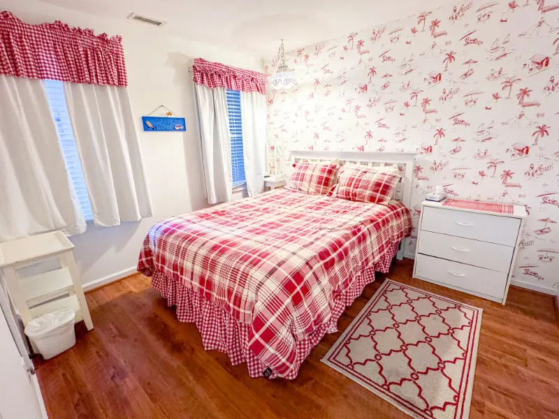 Antilles condo: Unit 4002 bedroom red plaid bedspread