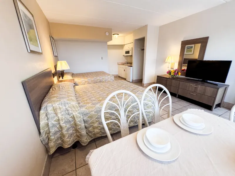 Janais queen beds and TV