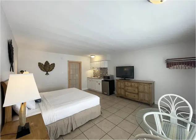 Cayman king bed and kitchenette